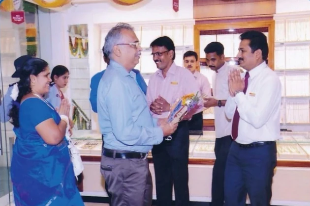 Welcoming customers at a jewellery showroom